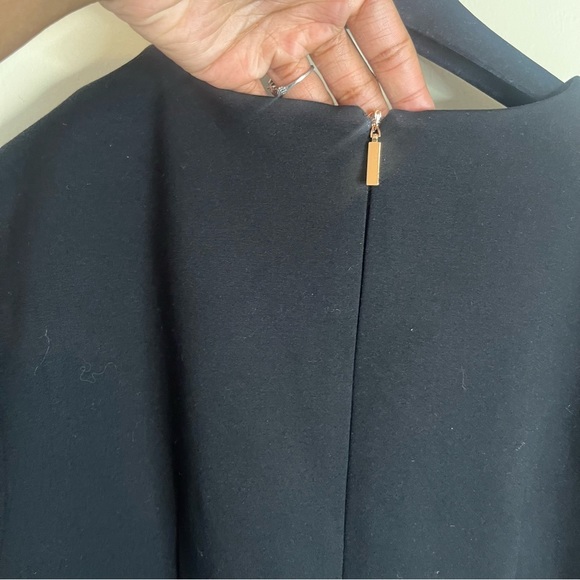 𝅺Tibi Stuctured Minimalist Ponte Knit Bishop Sleeve
Dress - Picture 11 of 11